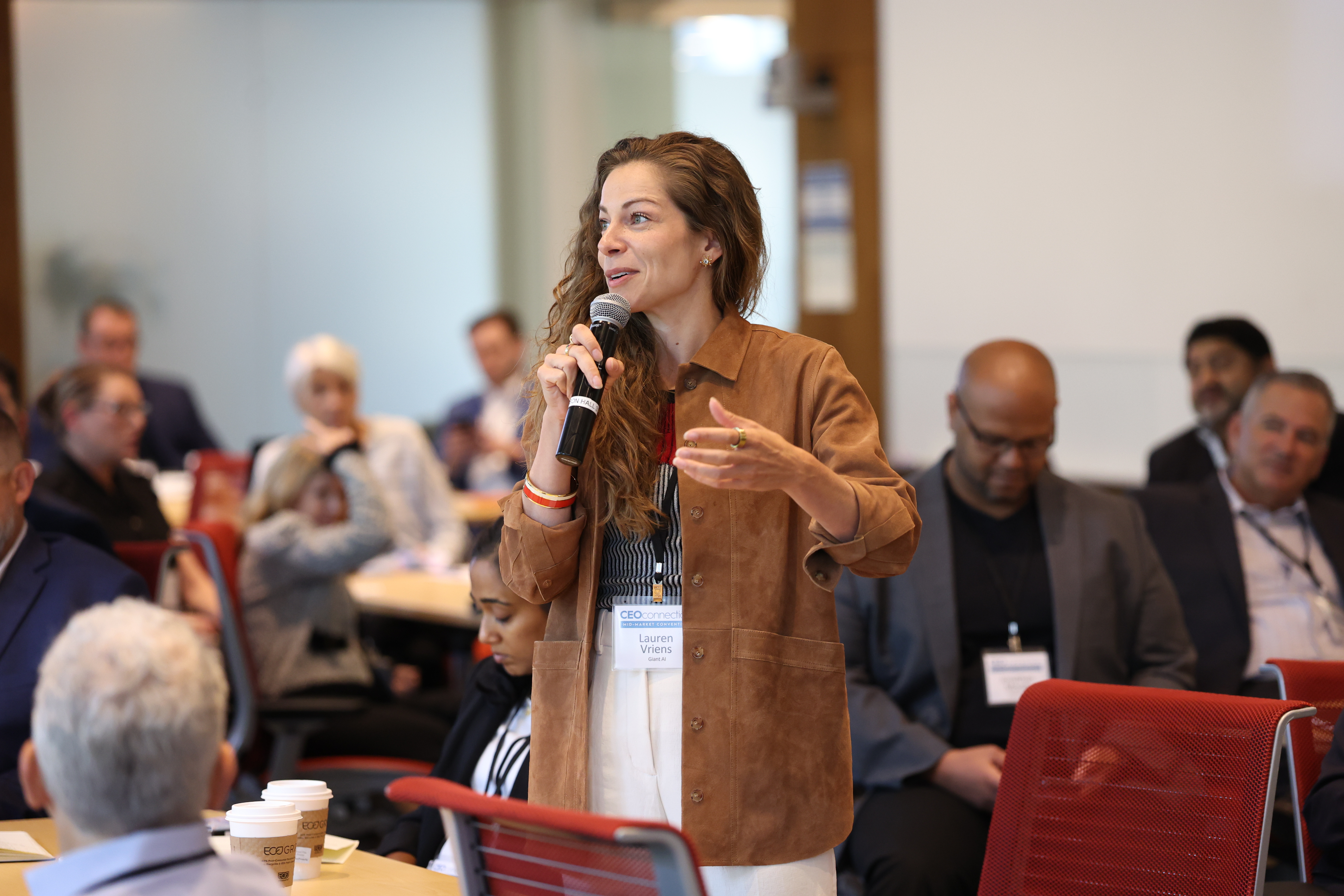 Lauren Vriens speaking on stage